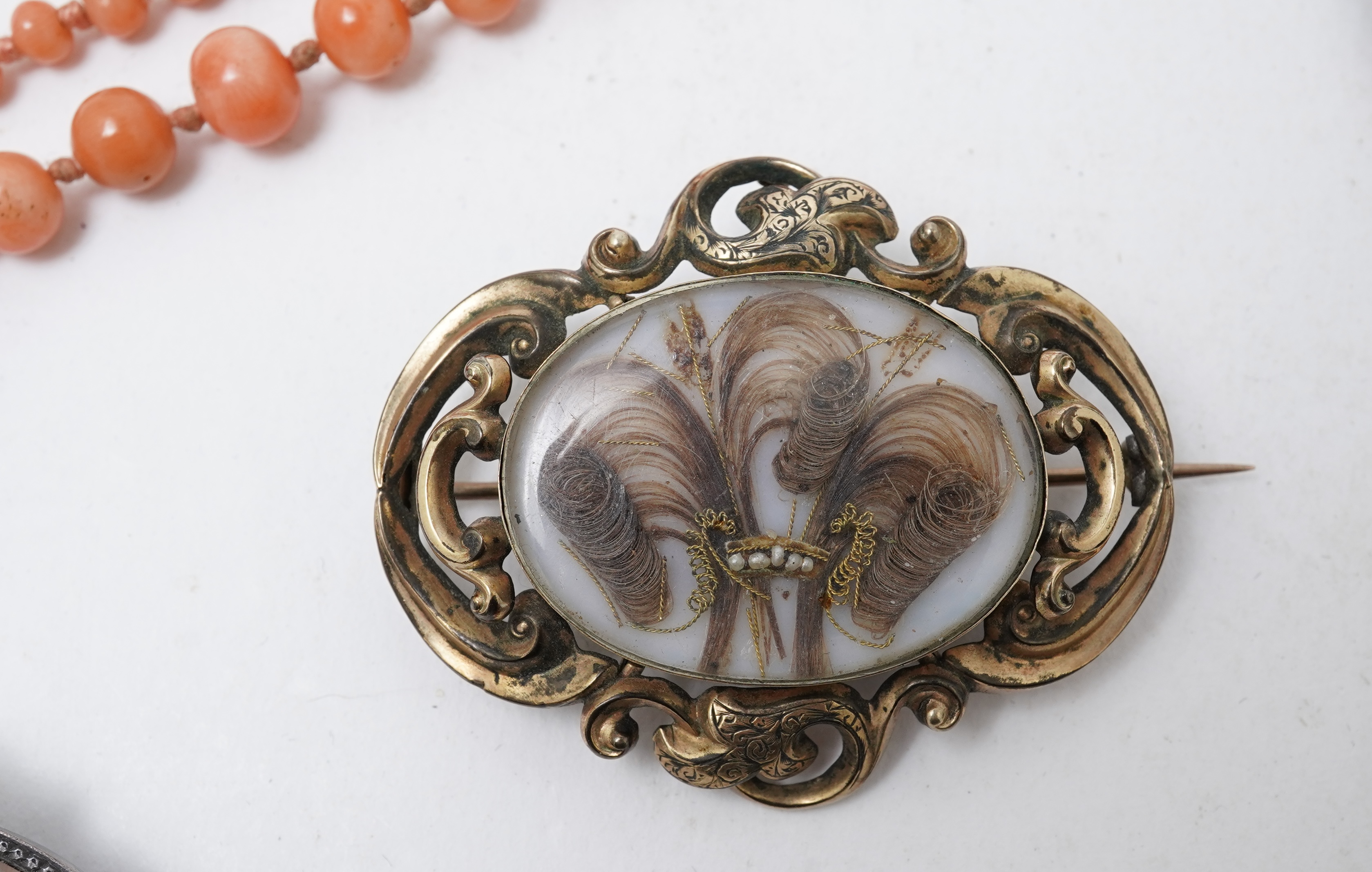 A collection of jewels including a coral necklace